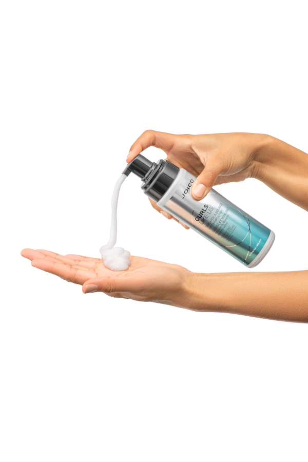curls like us foam bottle being poured into hand