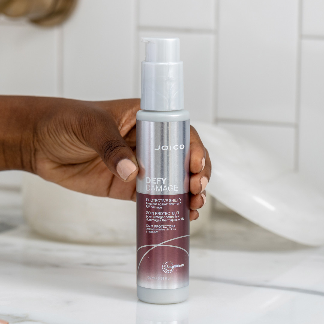 defy damage protective shield in hand on counter