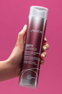defy damage shampoo in hand hair product