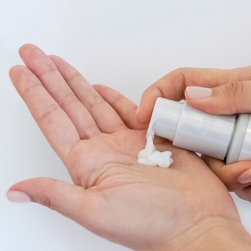 Defy damage shield showing product in hand