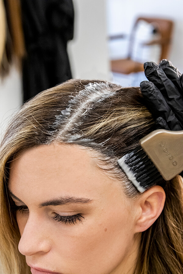 salonshoot-new Model image in salon getting roots touched up